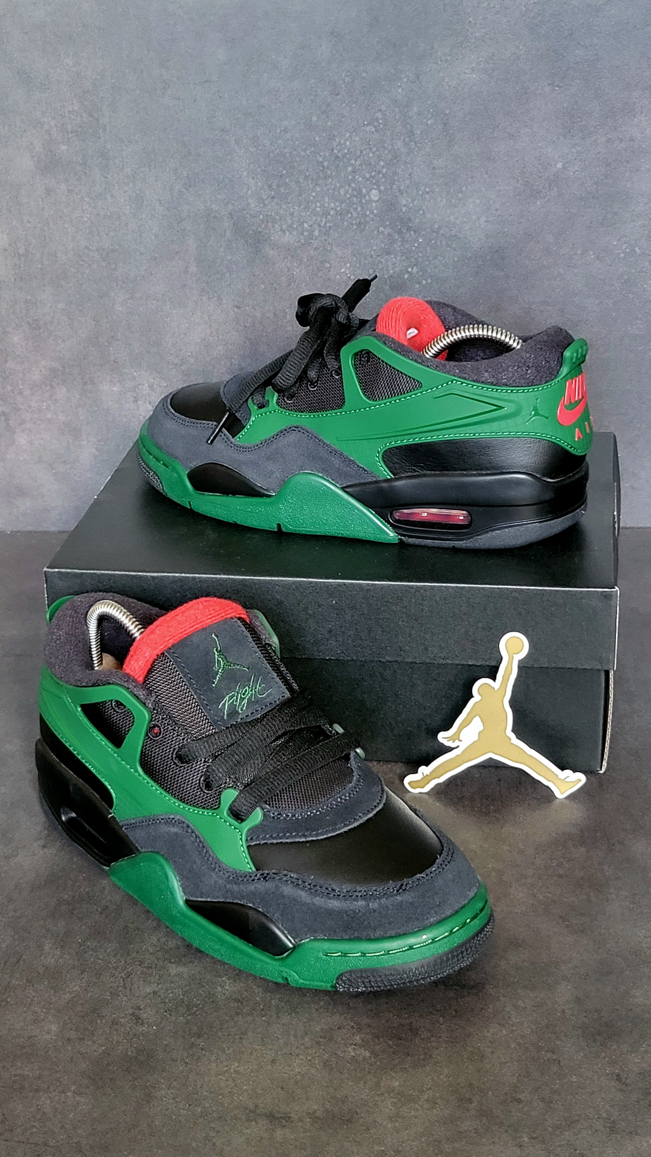 Air Jordan 4 RM 'Black & Gorge Green' (2025) photo 1