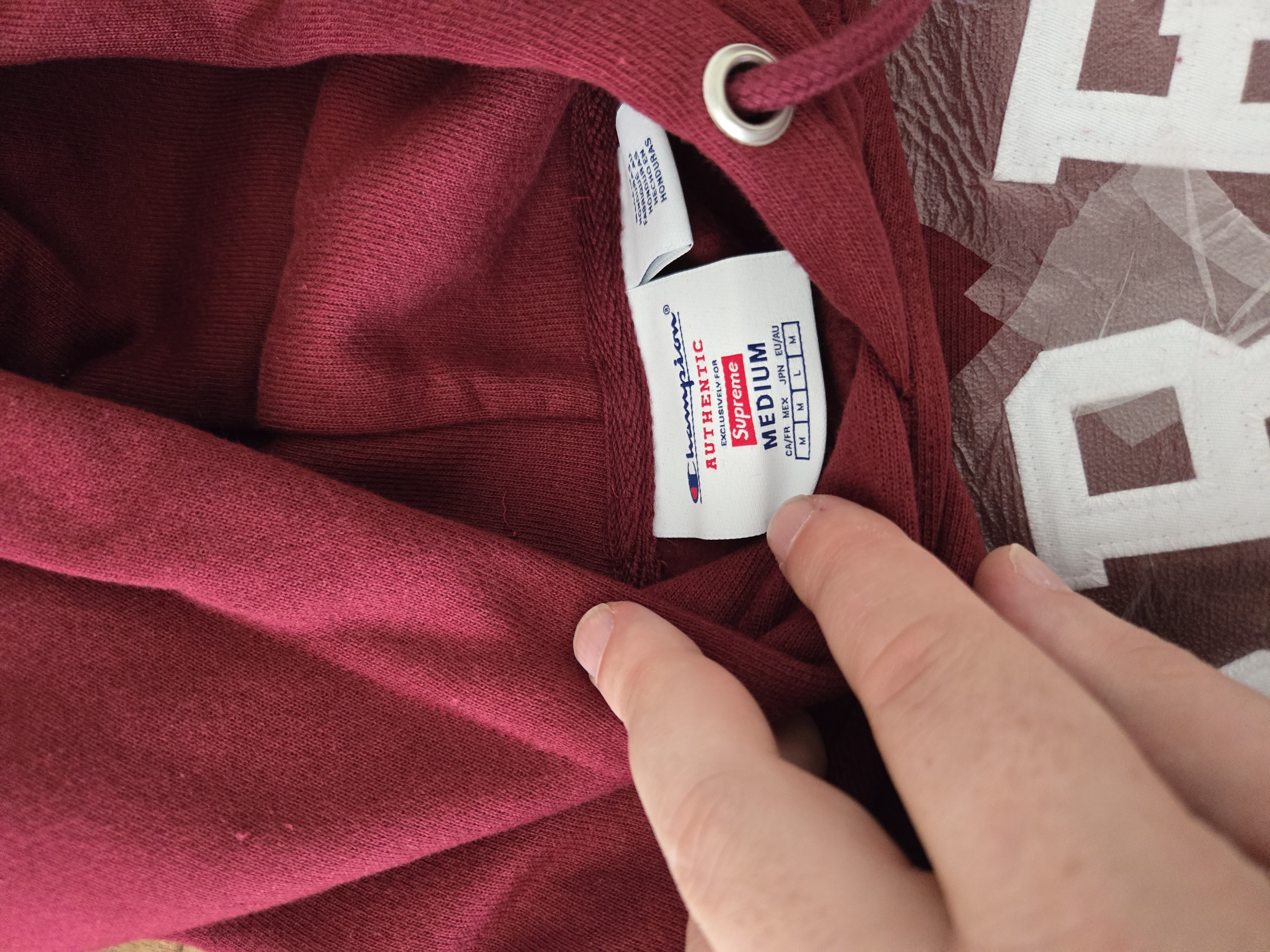 Supreme Champion Hooded Sweatshirt 'Cardinal' (SS25) photo 3