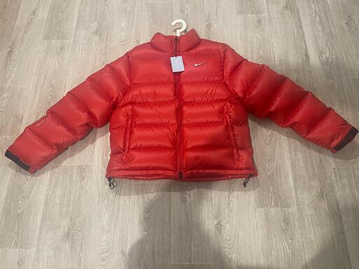 Nike Nocta Puffer Jacket Sunset