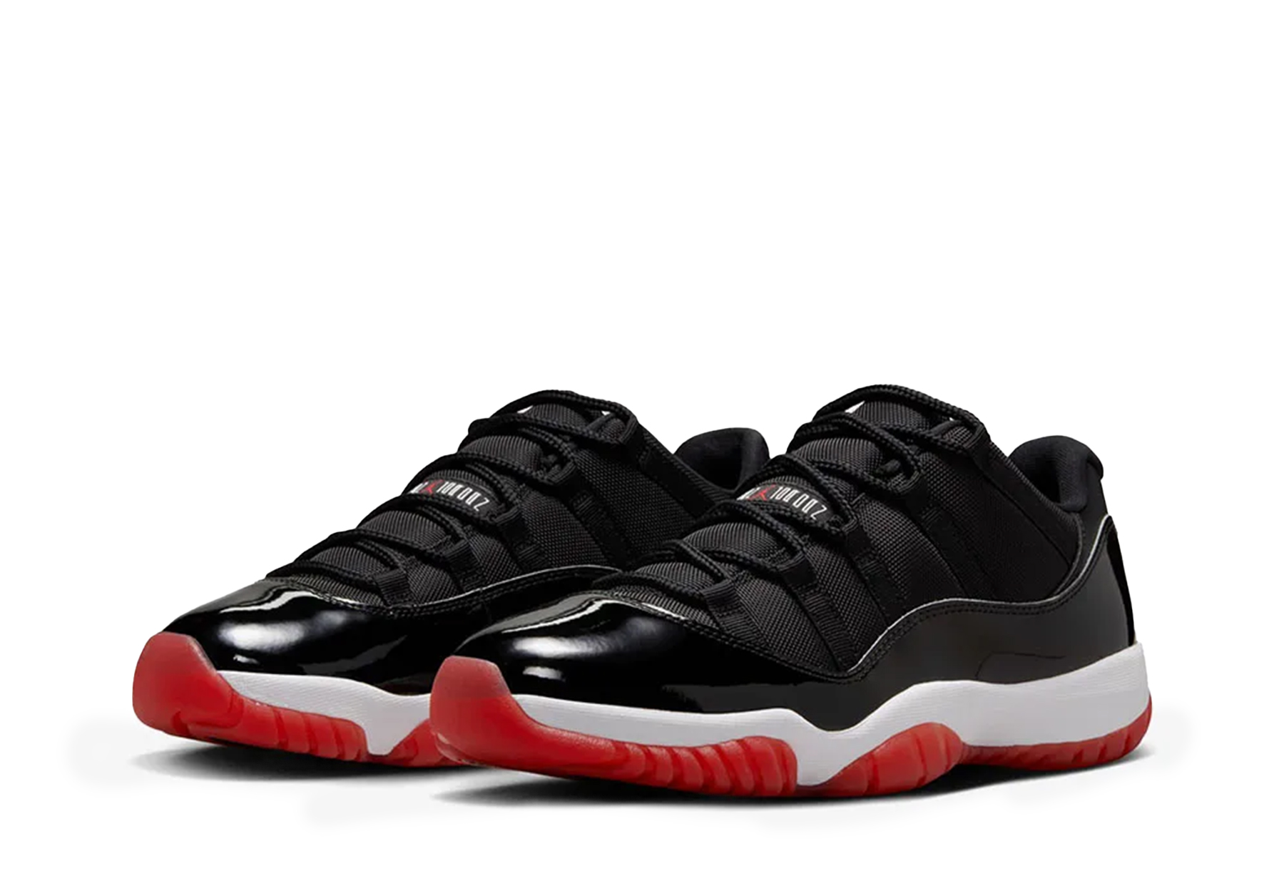 Air Jordan 11 Low 'Bred' (2025) Black/Red/White sneaker – authenticated on KLEKT